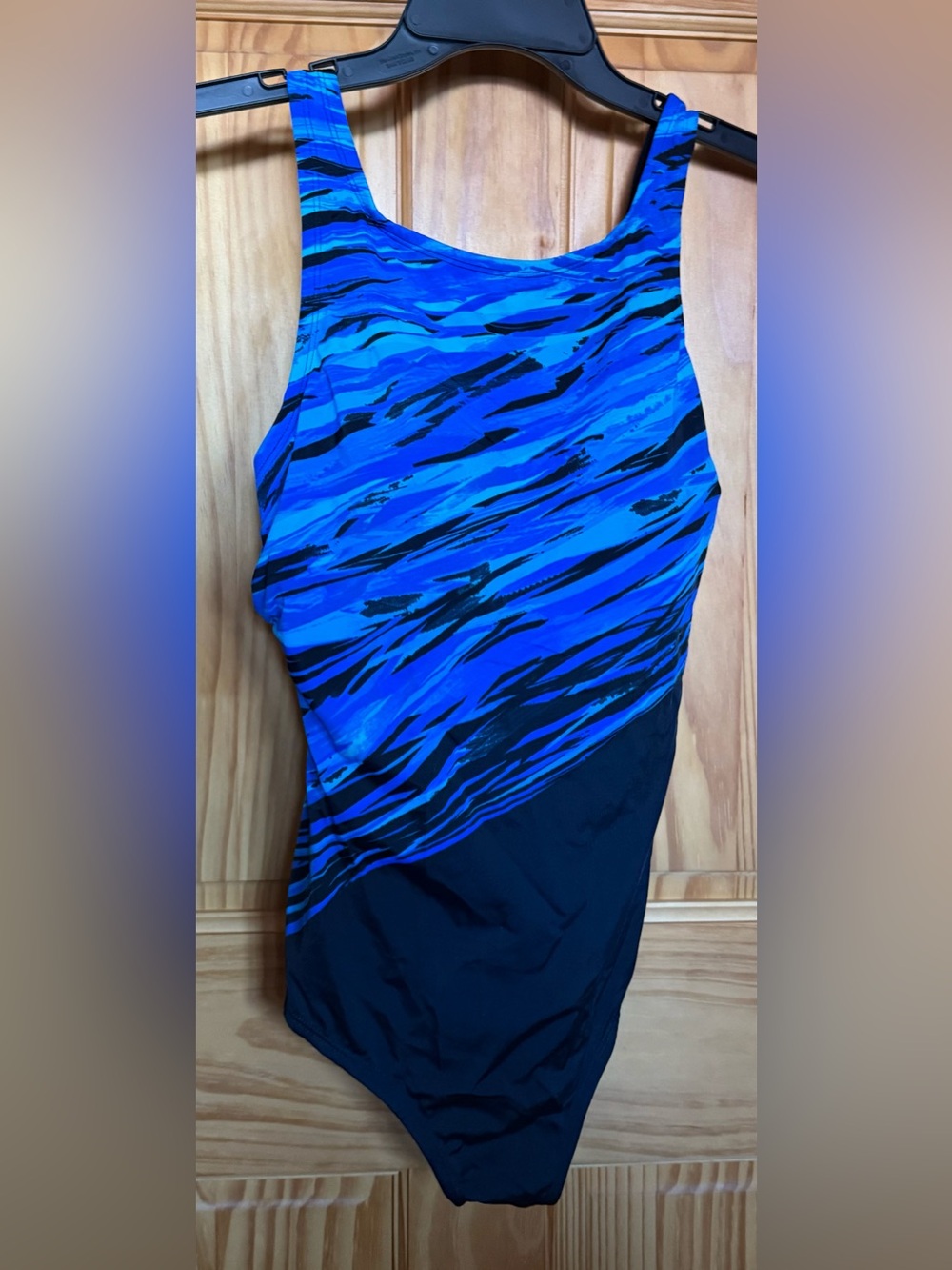 Reebok Swimming suit on beautiful blue and black.  12